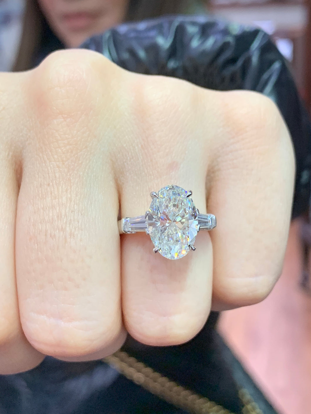 Oval diamond ring with baguettes Clearance