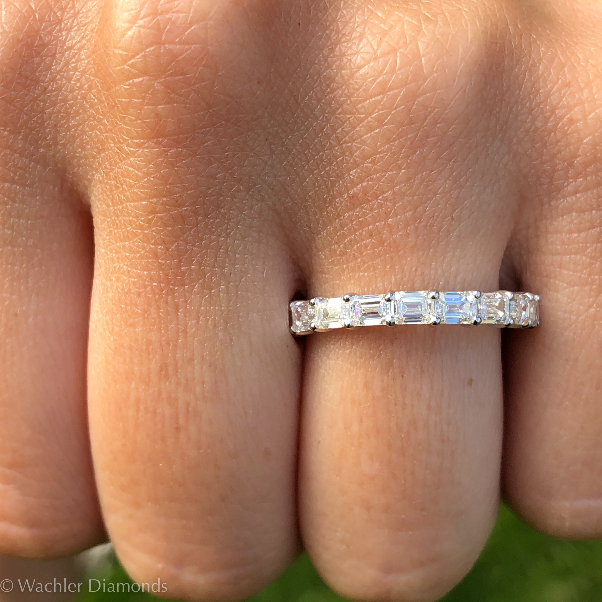 Emerald cut diamond on sale half eternity band